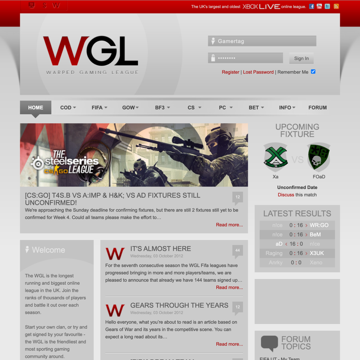 Screenshot of the old Warped Gaming League website. The site features a news feed about Gears of War and CSGO, an upcoming match fixtures list, and an overview of recent forum discussions.